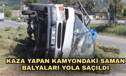 Kaza yapan kamyondaki saman balyaları yola saçıldı