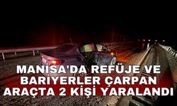 Manisa'da refüje ve bariyerler çarpan araçta 2 kişi yaralandı