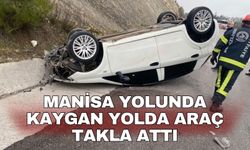 Manisa yolunda kaygan yolda araç takla attı