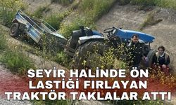 Seyir halinde ön lastiği fırlayan traktör taklalar attı