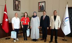 Rektör Kibar Dünya Şampiyonu Büber'i makamında ağırladı