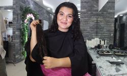 Manisa'da kadın 5 yıllık saçlarını kanser hastası çocuklar için kesti