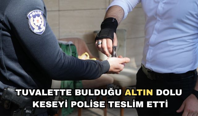 Tuvalette bulduğu altın dolu keseyi polise teslim etti