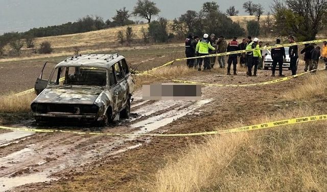 Dağlık alanda yanmış aracın kenarında başsız erkek cesedi bulundu