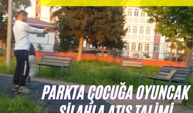 Parkta çocuğa oyuncak silahla atış talimi yaptırdı