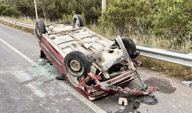 Takla atan otomobilde 2 kişi yaralandı