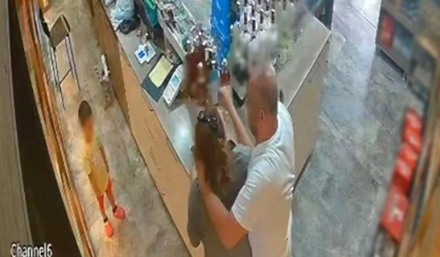 Çocuğunun gözü önünde eşini darp edip boğmaya çalıştı