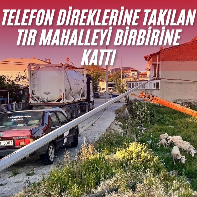 Telefon direklerine takılan tır mahalleyi birbirine kattı