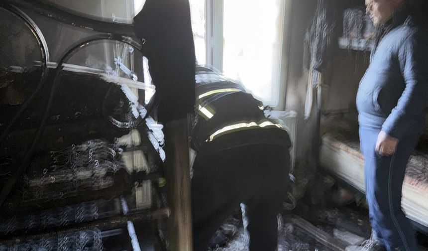 İzinli itfaiyeci yangına müdahale etti